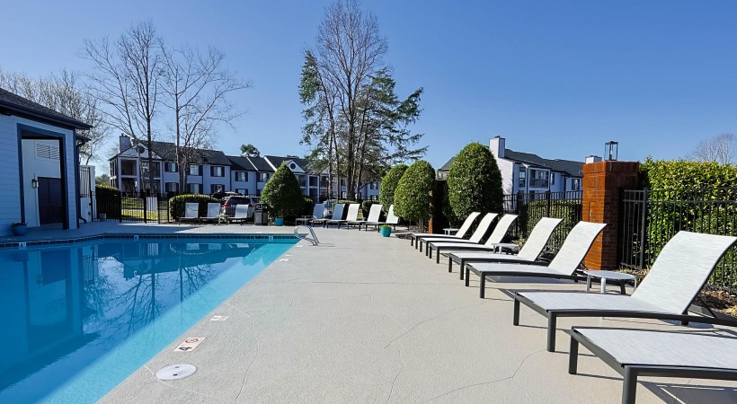 lounge chairs beside swimming pool